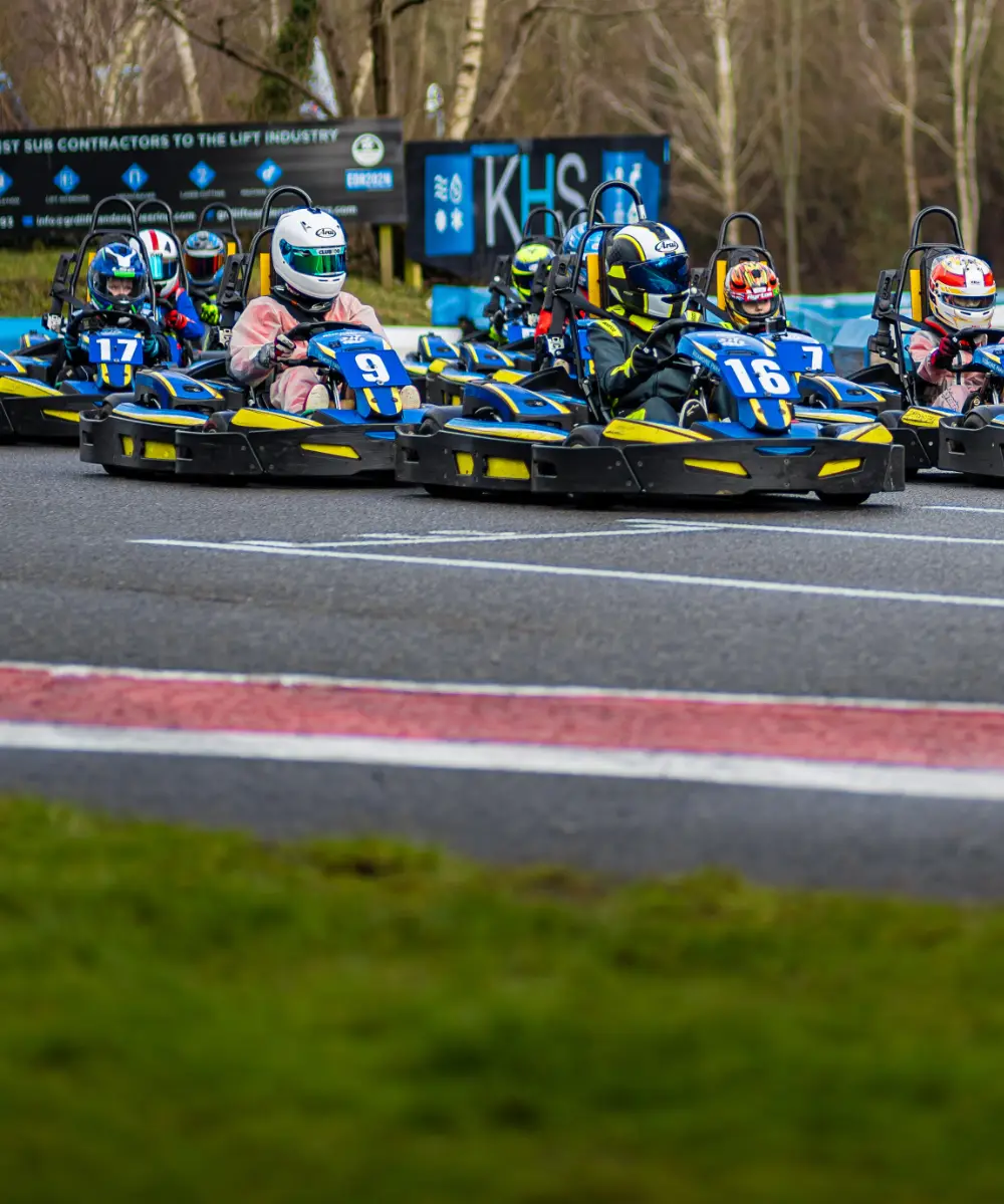 Junior club karters on the grid at Buckmore Park